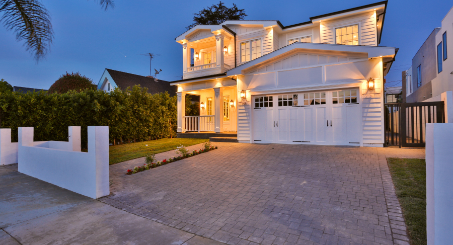 Illuminated traditional home at blue hour